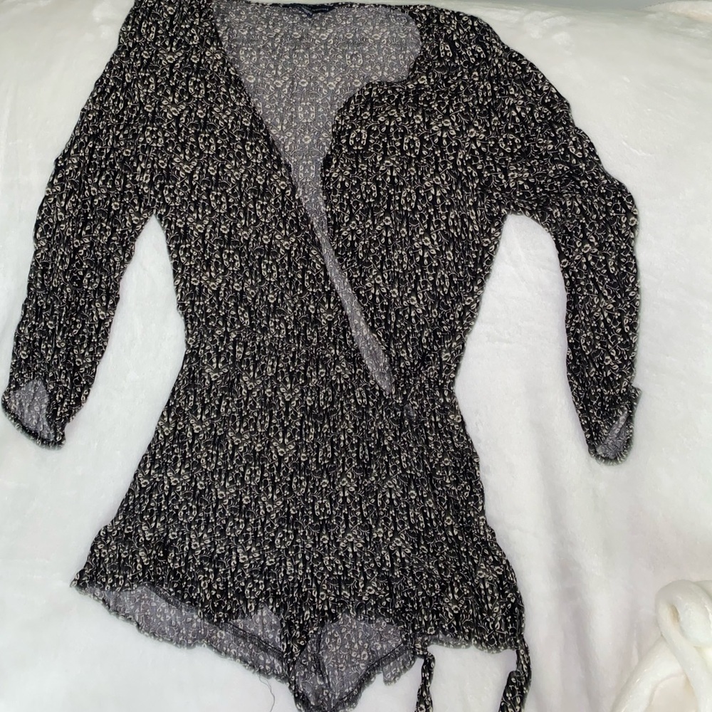 Black with tiny white floral print romper